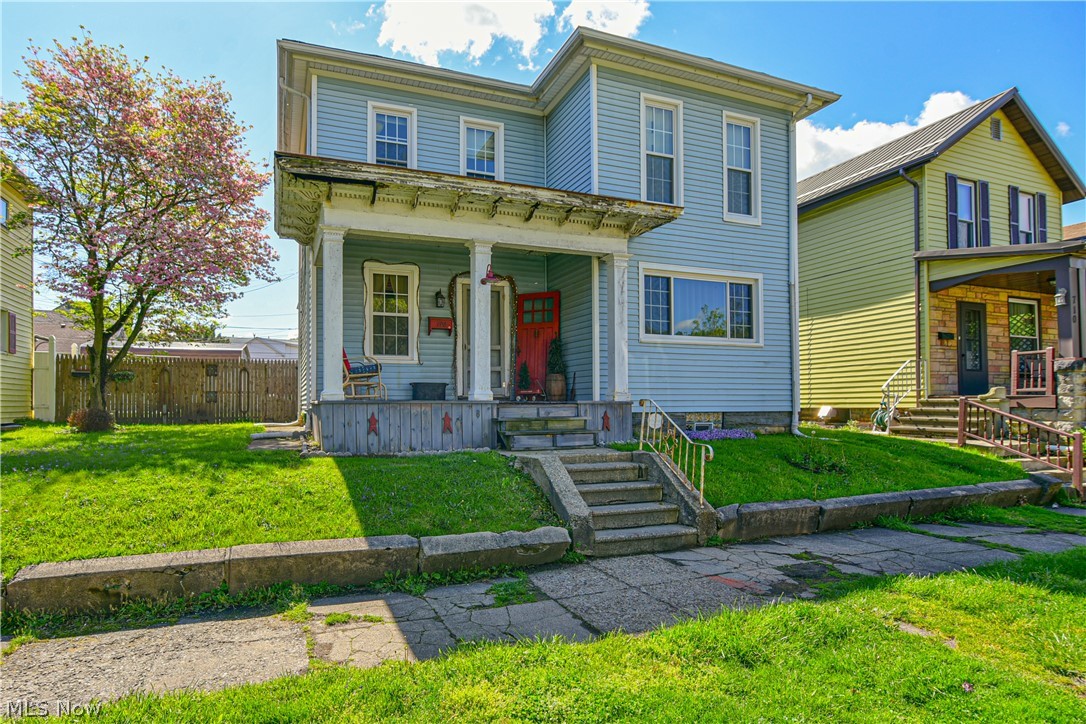 Walk into this totally custom, rustic gem, right in the center of Wellsville! Pride in ownership can be found in every inch of this updated family residence. Open the front door and you are immediately greeted with the most opulent reclaimed wood fireplace, and to the right of the foyer you will find the coziest family room, perfect for game night! The galley kitchen is adorned with custom cabinetry unlike anything you'll find in your average home, and custom butcher block counters. In the dining room you will find anything but your average wainscoting, but instead you'll see reclaimed barn tin, that is the crowing jewel to this farmhouse chic family home. The upstairs is just as eye catching as the main floor with three generously sized bedrooms and a totally jaw dropping one of a kind bathroom. The backyard is fenced in so Fido will feel just as at home as you are, and is complete with an above ground pool and a storage shed, there's also a concreate pad to park your car. Schedule your showing today!