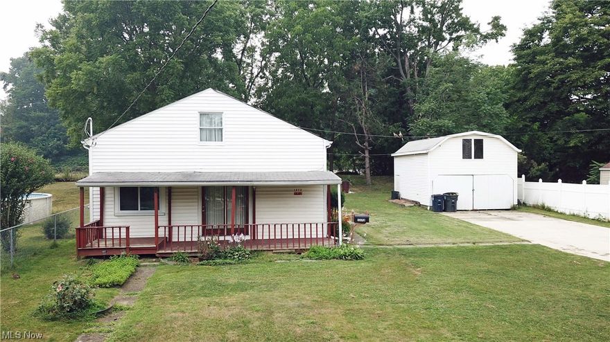 Welcome to 1372 Allendale Avenue!  Great opportunity for first time homeowner tired of renting. Would also make a great investment opportunity.   Front door opens to a spacious living room.   Kitchen comes equipped with a stove and fridge.  On the first first floor you will also find a bedroom, bathroom, and laundry. Washer and dryer included!   The second floor boasts three additional bedrooms.  Large two story, two car garage.  Outside you will also find a storage shed, spacious front porch and covered side deck. Quick access to route 77.   Don't miss out.  Call today to schedule your private tour.
