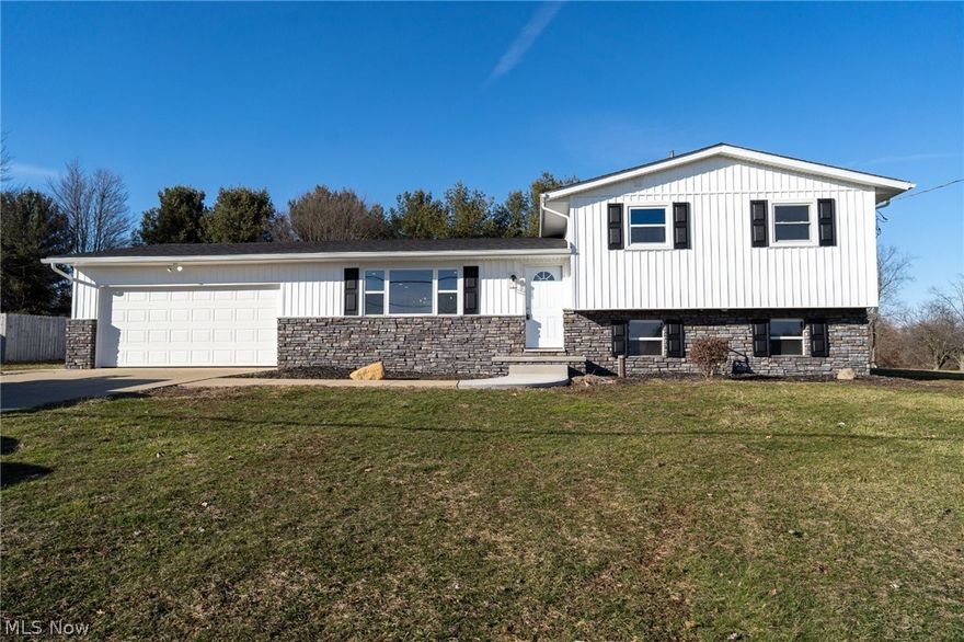 If you’ve been waiting for something that feels brand new in Lake Township on almost 1/2 an acre — this is it!

This 1,578 sq ft split-level has been completely transformed inside and out. Major exterior upgrades include a new septic system, brand-new roof, siding, gutters/dwnspts, windows, doors, and garage door — giving you years of worry-free living.

Inside, you’ll love the fresh, open, modern feel with new flooring, fresh paint, updated interior doors, and a gorgeous new kitchen featuring quartz countertops and stainless steel appliances. The sliding glass doors lead to a spacious new 16’x24’ patio — ideal for the summer gatherings that are quickly approaching! 

The upper-level has 3 spacious bedrooms with new carpet and the bathroom has been completely remodeled. A second full bath has been added in the lower level for added convenience. The family room is anchored by a brand-new electric fireplace, creating the perfect cozy retreat.

Move right in and enjoy!