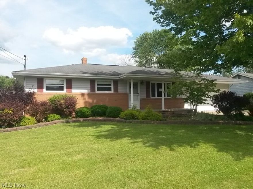 This home has been completely renovated, new granite counter tops, updated master bath, new ceramic flooring, new carpet, new hot water tank, new front door, and many other updates.  Match this with three bedrooms, master bath, dining are, formal living room, large family room, leading to spacious deck.  Kraftmaid cabinets, and hardwood floors.   This home will not last long , call today!