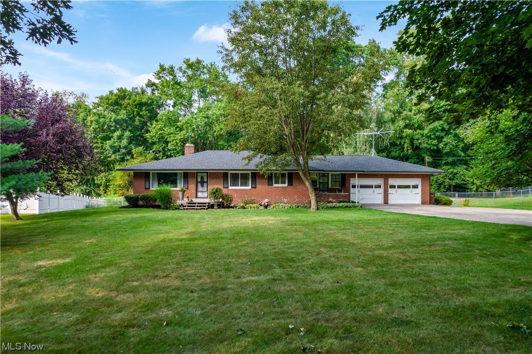Welcome to this wonderful Manchester gem that is sure to impress. Whether you're looking for a home offering plenty of space, garage space, large private yard, a home that offers you 100,000 cubic/ft of free gas per year, or a home that carries a little local history with it. It's all here! Originally Lester and Helen Yager's home, who's namesake is carried on in the area's street names. This well thought out ranch has over 1700 sq/ft of living space on the main level, with additional living space in the walkout lower level, 3 full bathrooms, generous sized rooms throughout, multi level 3+ garage space with workshop area, serene fenced backyard, deck, patio, wooded view, all on 1.49 acres! Many updates inside and out such as, Anderson windows, roof (3yrs), reverse osmosis system, water softener (2yrs), plus more! Did I mention the free gas!? You won't want to miss this one!