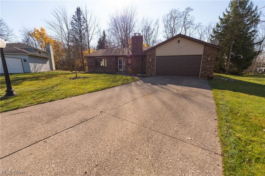 A BRAND NEW REHAB THAT CHECKS OFF YOUR WISH LIST! Refinished hardwood flooring throughout the living, dining and family rooms; white washed fireplace and sparkling remodeled kitchen maintain a clean, modern aesthetic. The spacious family room opens up into kitchen area with granite countertops, white shaker cabinets, a large peninsula with breakfast bar, brand new stainless appliances and durable LVT flooring. Both full baths are entirely new - the main bath provides a tub and shower combo and the master has a roomy step-in shower. Versatility is everything now and the basement has your flex space needs covered with an expansive open finished room including a fireplace and pre-plumbing for a wet bar. Additional highlights include large attached back deck, NEW FURNACE/AC, new electrical panel, updated electrical and plumbing fixtures, new carpeting, flooring and fresh paint, first floor laundry, attached two car garage and more! The basement also has framing and rough-ins for a 3rd bath