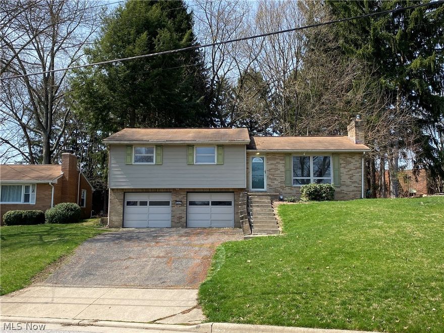 Great location and great value!! North Canton Schools. This home is very solid and features 1 & 1/2  baths and 3 bedrooms with a possible 4th downstairs.   This brick split level has tons of potential.  Home being sold "AS IS"