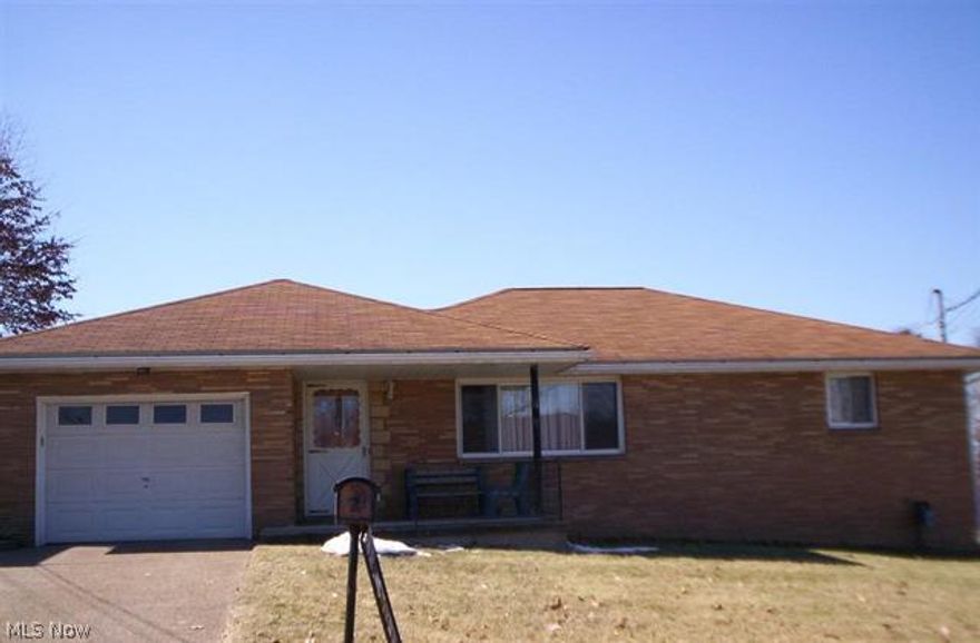 Darling, Immaculate & ready to occupy, states this 2 bedroom brick home.  DR, eat in equipped kitchen, step right into your kit from garage. Large  basement for storage + a storage rm.  1.5 baths. Newer carpet - This floor plan sells quickly! patio off Kit.  Home Warranty included.