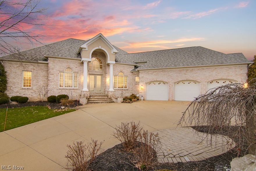 Welcome to this immaculate KNL custom built home situated on the 10th fairway of the desirable Mayfair East golf course. As new as the day it was built, this all stone home will wow you with incredible detail in woodwork and quality. From the two story foyer you see straight through to the two story great room with floor to ceiling windows facing the in-ground salt water pool and beautiful view of the golf course. The gourmet kitchen with granite counters, abundant custom built glazed cabinetry and stainless steel appliances is the heart of this home. Just off the dinette you exit to the beautiful outdoor living space with inlay brick patio surrounding the kidney shaped pool, stone water feature and lush landscape. The first floor master suite has a tray ceiling with uplight feature, abundance of windows, luxurious ensuite bath and large walk in closet. The first floor also features an office/den with beautiful built ins, the formal dining room, first floor laundry and dinette. On the second floor you will a loft which was designed to be easily converted to the 4th bedroom and has a walk in closet with Jack n Jill bath to another large bedroom. The third bedroom has an ensuite bath and walk in closet. In 2015 the current owners had the lower level finished by KNL Custom Homes. The open living area with stone fireplace is open to a gaming area, bar and full bath. There are so many great features in this luxurious home and is priced well below the cost to build.