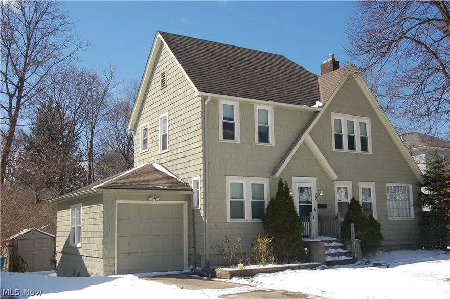 This charming colonial is located on fantastic street.  All 3 bedrooms with wood floor.  Enclosed sun porch off the living room.  Bright basement with block glass windows.  Deck off the kitchen.  Close enough to walk to town.