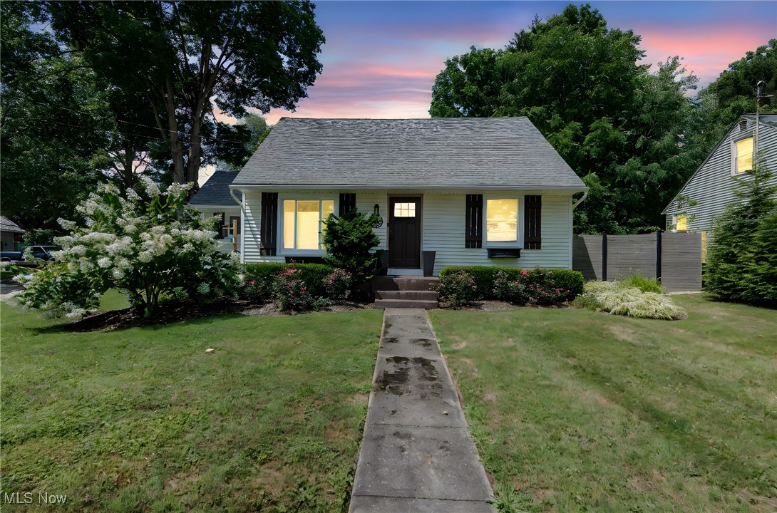 Impeccably updated and move-in ready, this three-bedroom, two-bathroom home in Mantua offers a perfect blend of modern comfort and timeless style. Step inside to a spacious open-concept layout featuring stunning coffered ceilings, recessed lighting, and warm engineered hardwood floors that flow throughout. The inviting living room connects effortlessly to the custom kitchen, which boasts white shaker cabinetry, sleek countertops, stainless steel appliances, and a center island with additional storage and workspace. Upstairs, enjoy a private retreat with a true master suite feel—one bedroom and a gorgeous full bathroom are separated by a hallway, offering comfort and privacy. The outdoor space is equally impressive—ideal for entertaining or simply unwinding. Enjoy summer evenings on the deck, surrounded by a beautifully landscaped yard. A three-car detached garage and turn-around driveway provide ample parking and convenience. The fenced-in yard offers privacy and a sense of seclusion, even on this desirable corner lot. This home is the total package—stylish, functional, and thoughtfully designed inside and out.