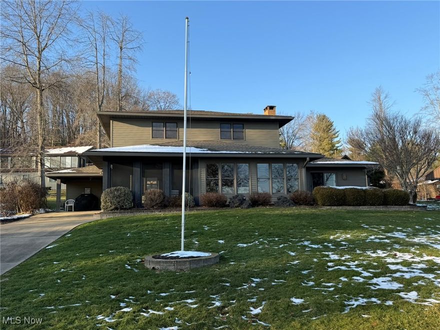 Beautiful lake home with 3 bedrooms, 3 full baths with impressive quality finishes.  Views of Atwood Lake with private 30' vinyl dock.  Raised panel wood doors.  Spacious living room features stone gas fireplace.  Updated kitchen includes stainless steel appliances.  Main floor laundry and full guest bath.  Main floor master suite includes built in cabinetry and full bath with walk in shower.  Enjoy your morning coffee or evening drink while enjoying the views from the screened in porch.  Fantastic property for year round living or a weekend get-a-way with the family.  A must see!  MWCD lease fee of $2,343 annually for 2025.