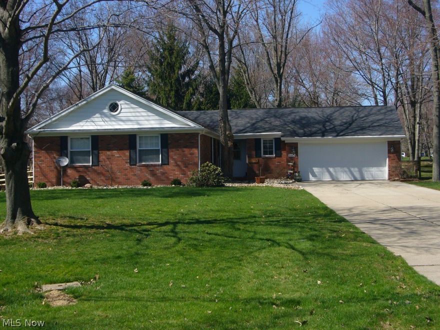 Very sharp 4 bedroom brick ranch on a beautiful lot, in "move-in" condition. Beautiful updated kitchen with granite counters, custom cabinets, fully applianced, great room with woodburning fireplace, hardwood floors, lots of storage, intercom system thru-out home, master bathroom, 1st floor laundry, finished rec room, with many other updates:  kitchen appliances (2013), kitchen (2013), A/C (2013), newer furnace, some newer windows, sump pump & septic upgrades (2014 & 2012), 2 car attached garage, fenced yard with deck, and small double tiered barn, all on nearly 1 acre lot.  THIS HOME WILL NOT LAST!!