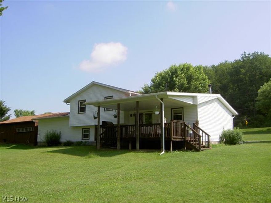 Very nice, well kept 3 bedroom, 1.5 bathroom home sitting on a beautiful 1.37 acre lot. This home has an updated kitchen with plenty of cabinet and counter top space, an eating area with patio doors leading to a relaxing covered back patio overlooking a large back yard, a living room with wood burning fireplace, a separate family room, 3 nice sized bedrooms, possible 4th bedroom that is currently being used as a laundry room, updated bathrooms and a lower level that is neat, clean and perfect for storage. There is a 2 car attached garage and a 24x30 detached garage. Many recent updates including the kitchen, bathrooms, roof, insulation, windows, doors, heating/cooling, and siding to name a few.