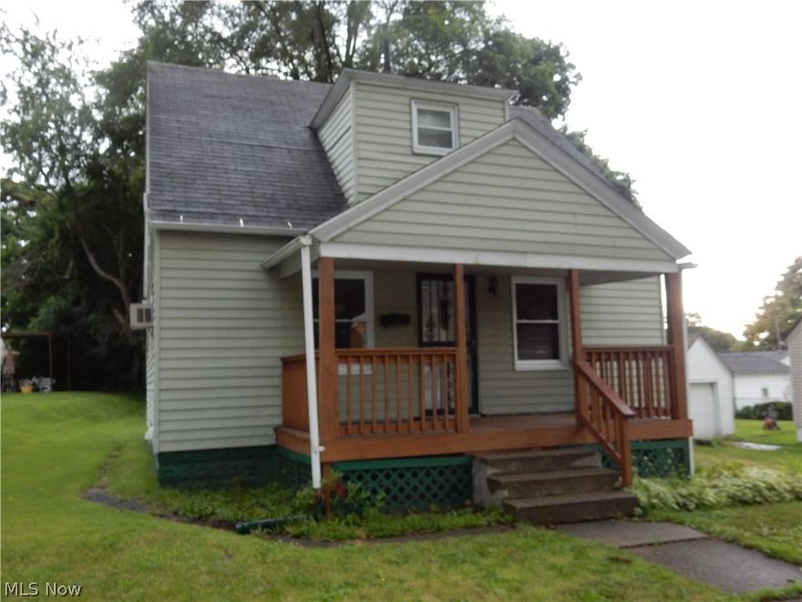 LARGER....than it looks. You will love the updates in this very cute cape/bungalow. The open concept main floor offers a spacious kitchen with plenty of cabinet space that opens to the dining room. Nice tile flooring flows through this area. Just off the dining room, enter into the "just the right size" living room with beautifully refinished original oak flooring. You will also find a main floor bedroom that is currently being used as an office and a mud room to enter through the back door. Upstairs is the full bath and 2 bedrooms with ample closet and storage space. Many of the updates include: electric, windows, kitchen, dining room, flooring, totally remodeled bathroom and fresh paint throughout. The basement offers all glass block windows and is home to the laundry area, mechanicals and has plenty of storage space. The large front porch is a perfect place to take a break and enjoy a cup of coffee. The large yard has been well maintained and you will love the over-sized 2 car garag