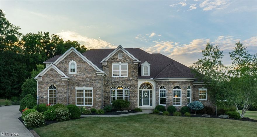 It's done! All the improvements.  Rec room with bar in lower opens to stone patio with fire pit,  gas grill and view of the pond.  Granite counters, tile floors & appliances to stay.  A family live-in suite on first floor compliments vaulted great room & formal dining.  1st floor master suite plus 4 bedrooms up with bonus room  conversion makes family living at it's finest.  Over 1 acre of beautifully landscaped grounds.  Plenty of capacity with a 3 car, insulated & heated garage.  One owner home custom built  by John Hershberger.  2 heating and cooling systems.  2-200 amp electric panels. electric budget $141 gas $57