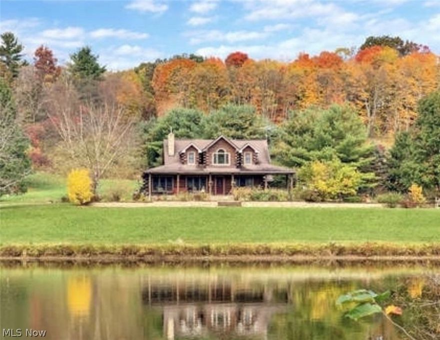 Stunning custom log home on 13.11 acres.This one of a kind home features 3 large bedrooms and 2 baths. Upon entering, you can’t help but marvel at the views.The stocked pond sits to the right and offers majestic views. Designed to enjoy the most fantastic sunrises and sunsets, this luxurious cabin opens to stunning craftsmanship featuring exposed logs, beautiful hand-carved beams and a stone fireplace. The kitchen is updated and Has a charming dining room attached. The sunroom is also on the main floor which has ample windows offering amazing views. The natural light and views of the pond truly take your breath away.The bedrooms are spacious and offer plenty of storage. The Master is on the first floor and has its own custom bath with duel entry.The porch in the back Of the home offers perfect views of the sprawling Manicured land and pond. On the second level of the home has two spacious bedrooms both adjoining a third room that can be considered a bonus room or even an extra bedroom.