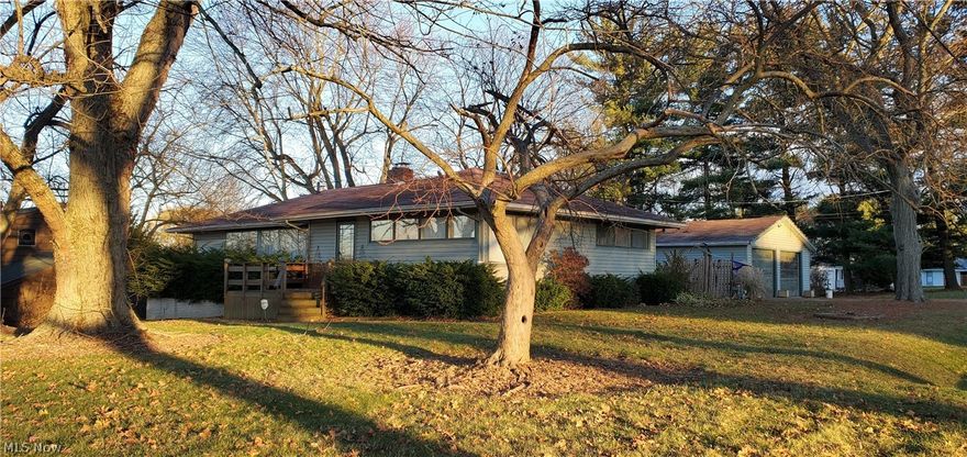 Welcome to a classic mid century 3 bedroom 2 bath ranch on a 3/4 acre lot. The open floor plan lends itself to comfortable lifestyle living. The living room with fireplace has large windows that bring in light and views of farm land. The ample sized adjacent kitchen and formal dining area are perfect for family gatherings. The full walkout basement has a workshop and 377 square foot partially finished recreation room that can add additional living space. The exterior deck that is perfect for warm weather entertaining, leads to an oversized detached garage. For additional storage there is a shed that can accommodate lawn equipment too.
The home needs some updating, but has tons of potential and the convenience of first floor living. This home is being sold as is.