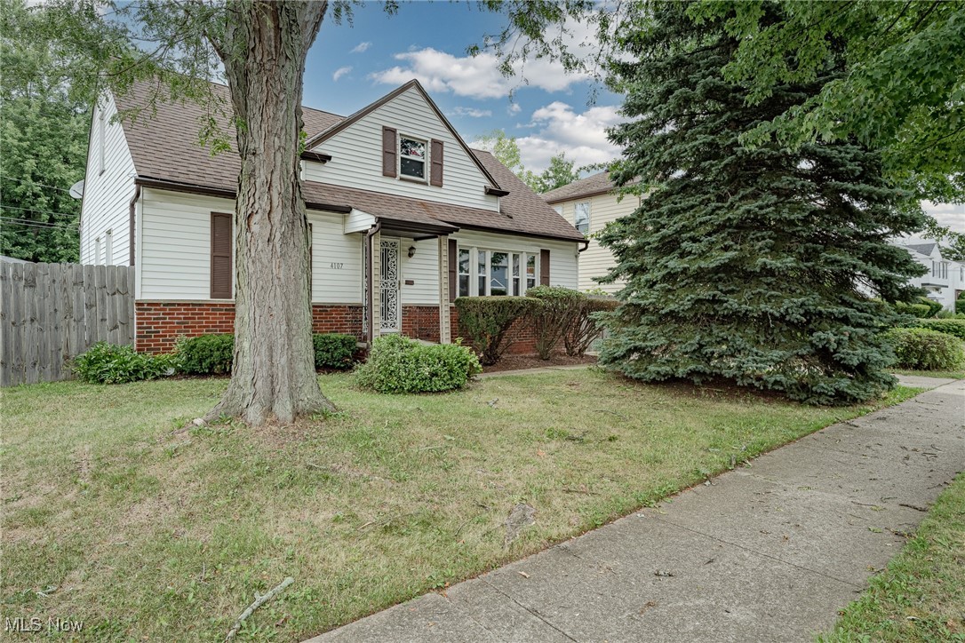 Explore this charming Cape-Cod in South Euclid! This home features over 1400 square feet of living space, 3 bedrooms, and 2 bathrooms. The front door open into the spacious living with beautiful LVP and ample natural light. The living room flows into the kitchen, here you will find a full complement of appliances and plenty of cabinetry space and tile flooring heading towards the back of the home lies the dining space with beamed ceiling. Adjacent to the staircase, you will find 2 bedrooms both with LVP flooring and ample closet space and a bathroom with tile flooring and tile backsplash. Heading upstairs to the large and spacious primary suite with private ensuite bathroom and flex space to use for your convenience. The finished lower level provides plenty of extra storage space which has been waterproofed. Outside you will find a detached 1-car garage and a fully fenced in spacious backyard. Conveniently located near restaurants, shops, and highway access!