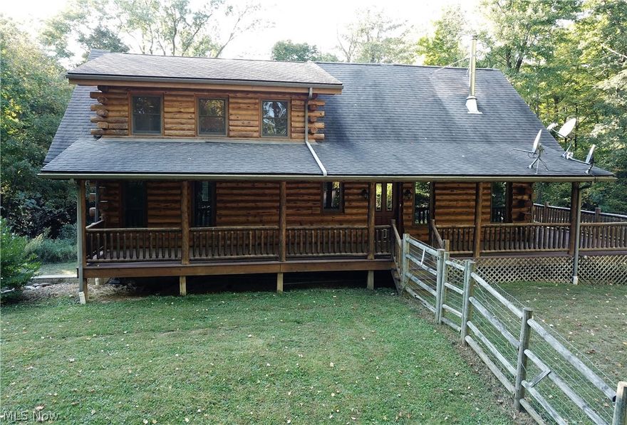 Ever dreamed of living where the blacktop ends? Your dreams can now become a reality! This one owner log home sits on 7.66 secluded acres surrounded by an abundace of nature. This home features amazing views from its wrap-around porch as well as its screened-in three-season room with stunning stone fireplace. This property has a fenced-in yard so even the family pets can enjoy the great outdoors. On the main floor, there is an open floor plan with vaulted ceilings and floor to ceiling windows to enjoy all the natural light that surrounds you. The living room is complete with a fireplace to keep you warm on those cold winter nights. The kitchen features updated appliances and an island with a butcher block top. The main floor is complete with 2 bedrooms a full bath and laundry area. Upstairs you are greeted with an open loft. This space is perfect for an office with spectacular views overlooking the lower level. The owner's suite features an enormous room, walk-in closet and a bathroom