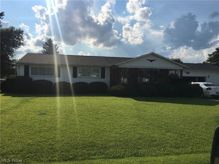 On corner lot three bedroom two bath home.