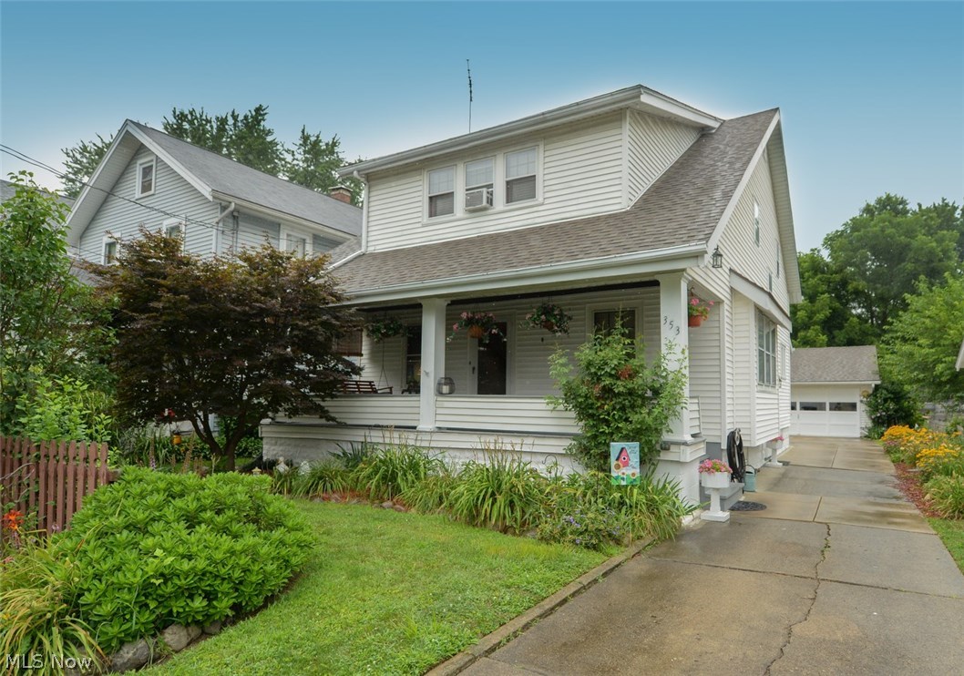 Gorgeous North Hill Colonial! This 3 bedroom home has so much space and perfect condition original woodwork. Open living room with a working wood burning fireplace. Custom archway leads into the formal dining room. Huge kitchen features tile flooring, tons of solid oak cabinets and pantry, stainless gas range and refrigerator, new disposal, recessed lighting, tile backsplash and room for a table or island. There's a half bath with new sink and toilet. Plus a bonus room that could be a den, playroom or 4th bedroom! Upstairs is a full bathroom, built-ins in the hallway, 3 bedrooms and the office space. The bedrooms all have very large closets. Back down to the super clean basement with a shower, workshop area and fruit cellar. Enjoy your outdoor time on the large covered front porch, back patio and green yard. Two car garage and long paved drive will suite all of your parking needs. The home is carpeted, but underneath are original hardwoods. Range and fridge just a couple yea