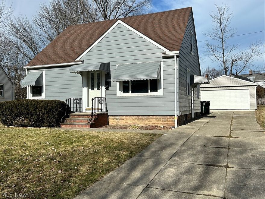 Beautiful 3 bedroom Cape Cod with partially  finished basement and 2 car garage. Updates include new kitchen cabinets with stainless steel appliances including stove, refrigerator, dishwasher and microwave. House improvements over the last 3 years include new roof, vinyl windows and new garage. Hardwood flooring in the living room with new carpeting in the bedrooms and basement. Off the kitchen in the back of the home is an addition that can be used as an eat in kitchen, family room, den or sun room. Features include central air, glass block windows, and garage openers . House to be point of sale compliant with the city of Maple Heights.