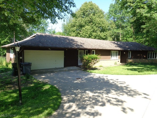 Spacious Ranch Home With Over An Acre Of Land Surrounded By The Metroparks!! 20x20 Outbuilding/Back Garage!! Two Car Attached Garage With Heater!! Loads Of Privacy For Your Family!! Open Floor Plan With A Large Great Room With A Masonary Fireplace!! All The Bedrooms Have Cedar Closets!! Master Bedroom Has Private Bath!! Approx 8 Year Old Long Concrete Driveway With A Turnaround!! Approx 10 yr old Roof!! Home Has Been Freshly Painted!! Flex Room/Living Room Can Be Used For Many Things!! Not Many Like This One Around!! Dont Miss Out!! There are 2 parcels #487-16-020 & #487-16-021.