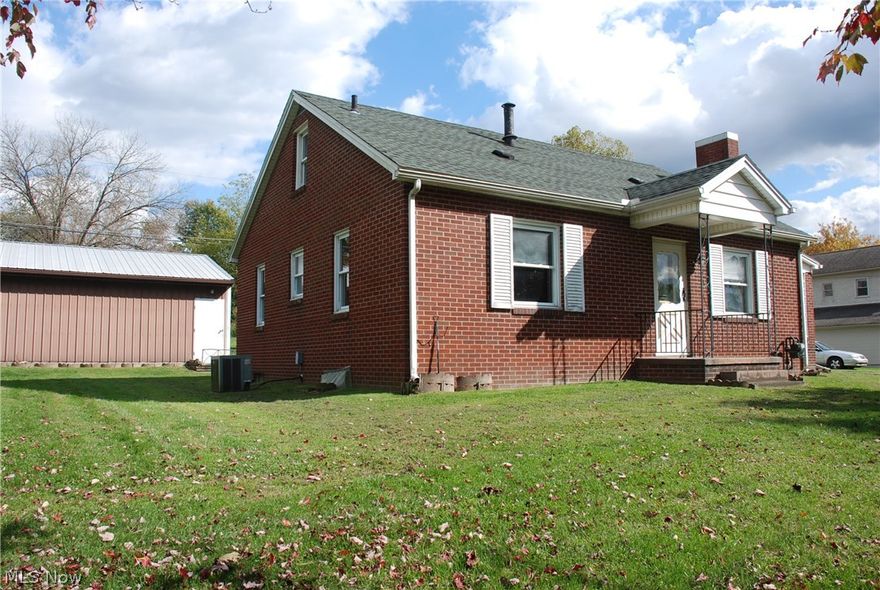 Brick 3 bdrm. one and half story. Nice sun room with updated flooring. Fireplace in living room.  Updated windows, hot water tank 2015. Large 40x24 pole building used  as garage built 2000. Garage is large enough for 4 cars or workshop too.  Perfect home for investor or a person wanting to do home decorating. Nice yard with extra storage building. Estate is Selling in AS IS condition. Addition square foot includes sun room. Great Price below auditors card value.