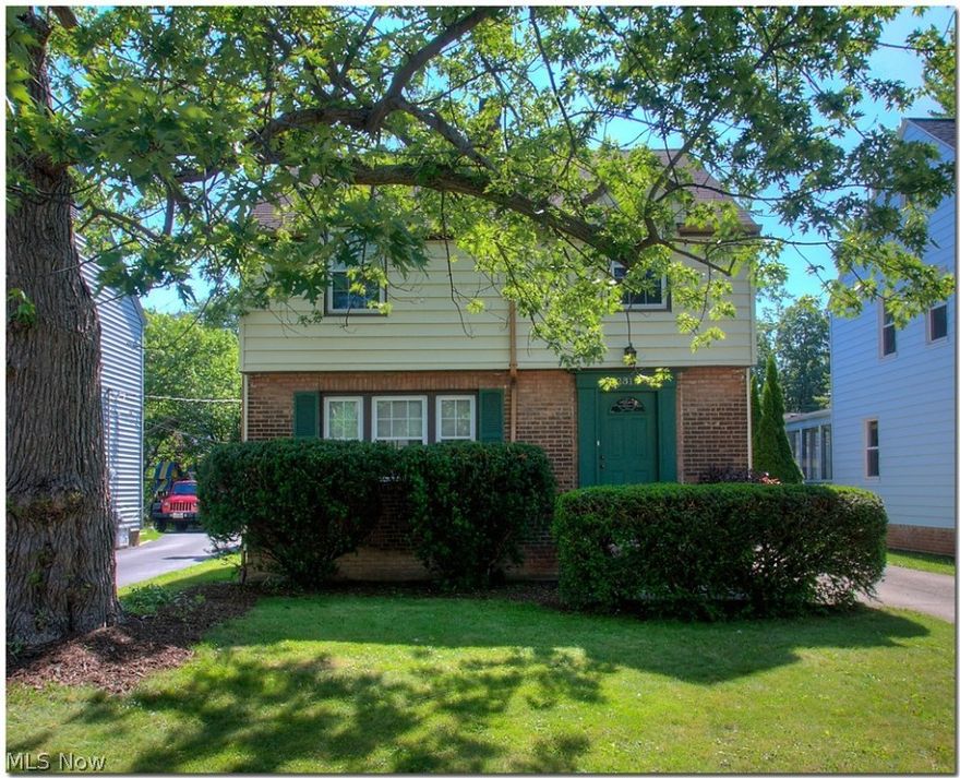 Charming home on a quiet street in University Heights. As you enter you are greeted by lots of natural light, beautiful hard wood floors and a gas fireplace in the living room. Formal dining room has built in bookshelves and entry to sun-room. First floor also has updated kitchen and ceramic flooring. All new appliances, 2009. The second floor has a large master bedroom with a unique view of the yard and neighborhood, just perfect for a romantic dinner for two, yet spacious enough for a string quartet. Outdoor cookout and entertaining can also be enjoyed from the large back deck. Third level offers additional room with plenty of space and storage. This property is in a great location to the well known areas of University Circle, Cedar Hill, Shaker Lakes, Coventry and Little Italy.