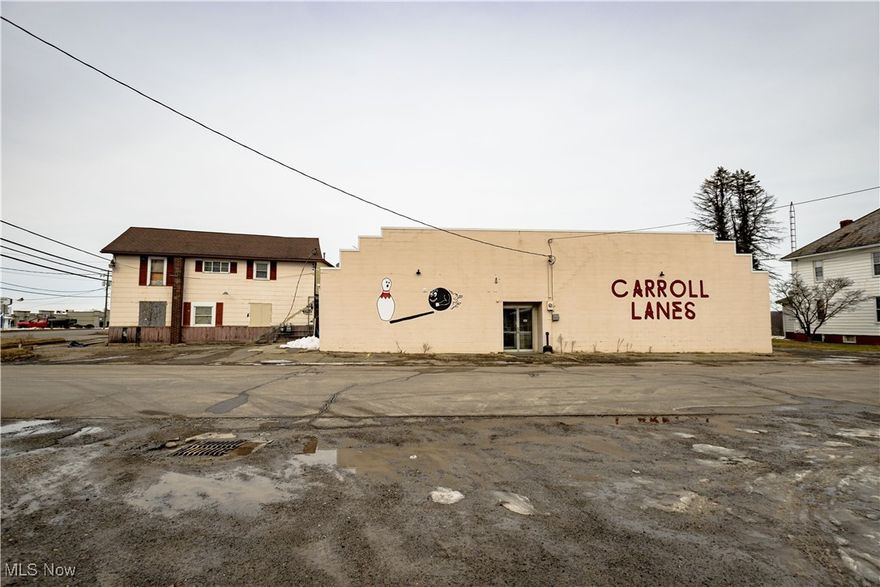 Here is your opportunity to own the "Carroll Lanes" bowling alley conveniently located along the main business district in Carrollton!! The 10 lane bowling alley has been recently updated with new synthetic lanes, new scoring system, new restrooms and more. The sale includes the real estate (5 parcels) , equipment/inventory and business. This rural bowling center is a great opportunity to own a family friendly facility with the ability to have leagues, private parties, open bowling and much more. There is huge potential in the attached restaurant/bar that was in the process of being remodeled and needs finished. This property has endless potential and it's in a prime location with high traffic and it could be an excellent investment for a savvy buyer. It is zoned B-2 Highway Business.