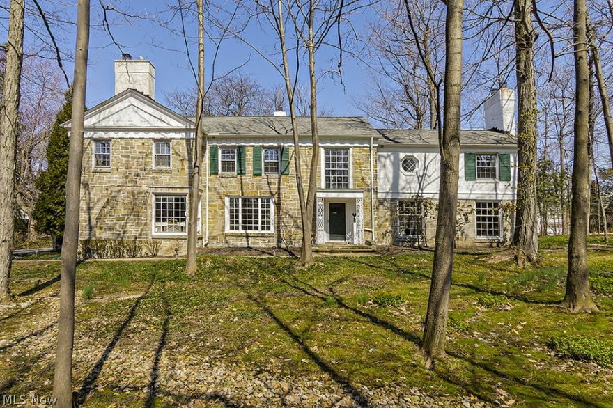 Spacious Norcross Designed Stone & Frame Colonial Featuring Lovely Detailing & Proportions.  Central Sweeping Foyer Staircase Opens To Main 1st Floor Rooms. Living Room w/Fireplace & Built-Ins, Library w/Fireplace & Bay Window. Great Glass-Walled Family Room/Sun Room Overlooks Yard & Features Built-Ins w/Wet Bar.  Formal Dining Room. Eat-In Kitchen. Master Suite w/Private Bath & Dressing Area. 4 Additional Bedrooms & 2 Additional Baths On 2nd.  Additional Bonus Suite Above Attached Garage w/2 Bedrooms & Full Bath.  Lower Level Recreation Room.  Tear-Off Roof 2009.  Furnaces 2013.  Gutters 2013. Ready To Be Restored To Its Glory.