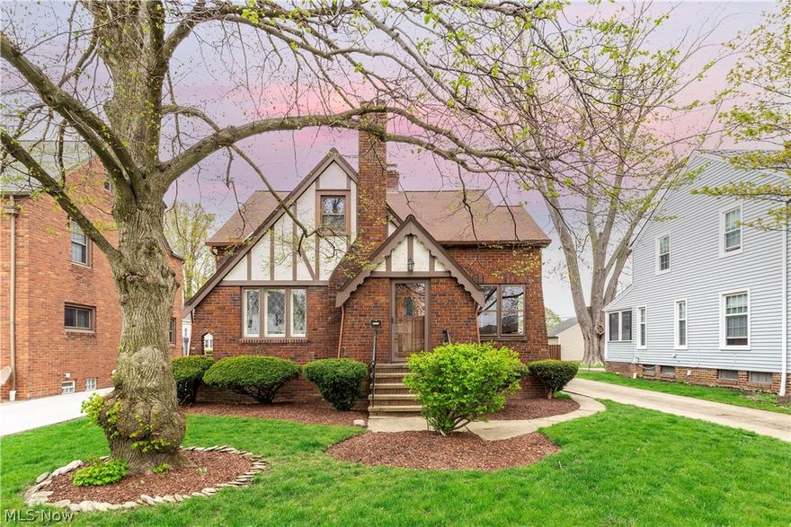 Prepare to be Moved!...into this remodeled and restored bungalow in Rocky River that combines classic elements like hardwood floors and natural woodwork.  The beautiful hardwood floors throughout have been refinished!  The living room is brightened by the gorgeous windows while the stone surround wood burning fireplace adds a touch of elegance.  The formal dining offers two large windows, warm wood corner cabinets and opens to the completely updated kitchen with stainless appliances, granite countertops, tile backsplash and hardwood floor.  Enjoy breakfast in the cozy eat-in nook! Two bedrooms - both with hardwood flooring, share the updated main full bath.  On the second level, three generous sized bedrooms share a convenient half-bath with large windows for a bright and airy feel.  These rooms also feature beautifully refinished hardwood floors. The lower level is finished into a fun and cozy rec room complete with a built in bar area perfect for entertaining!  Laundry and a half bat