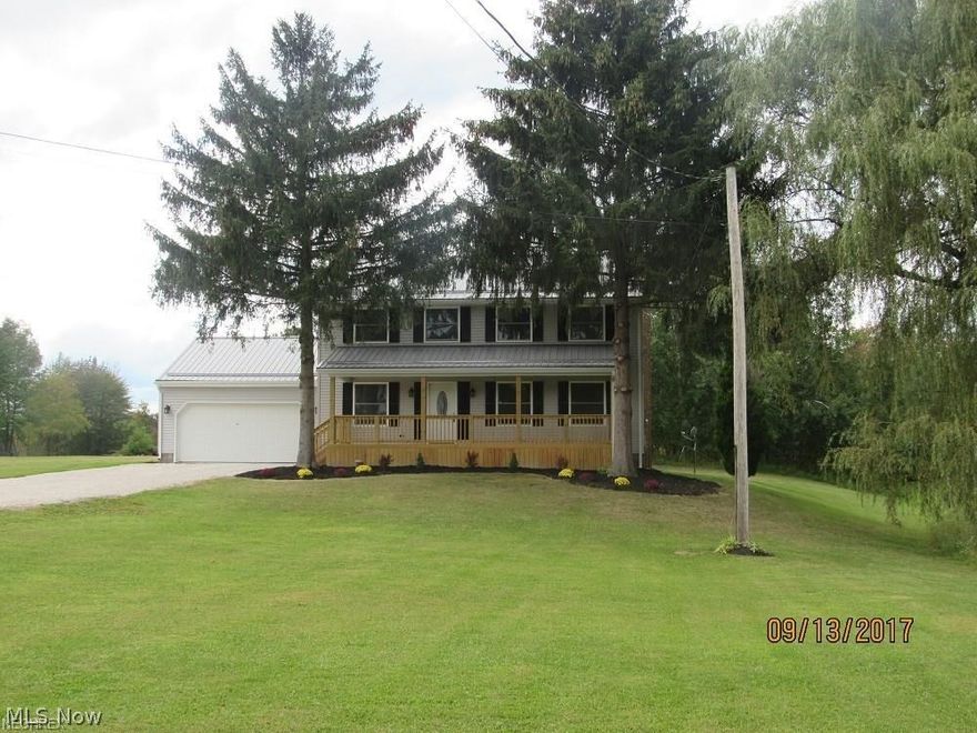 Exceptional ! Immaculate ! Exquisite! This Home has it all. Set back from the road; picturesque on a slight knoll, this beauty offers a
Brand new metal roof, vinyl siding, gutters/downspouts, doors & storms, all new windows and attractive landscape. A large covered front
deck accentuates the appeal of this stately lady! From the moment you enter, the quality abounds throughout. All newly painted, carpet,
and flooring and gorgeous trim in all living areas. The new kitchen features beautiful wood cupboards with crown molding and a ton of
counter space, all new stainless steel range, fridge microwave and dishwasher, truly a chef's dream. The formal dining room is great for
entertaining or gatherings. The formal living room offers bright windows, or relax in the family room with a gorgeous brick fireplace
boasting a carved wood mantle and sliders to the large deck overlooking a peaceful back yard, also on the 1st floor is a new half bath for
added convenience. The 2nd story offers 4