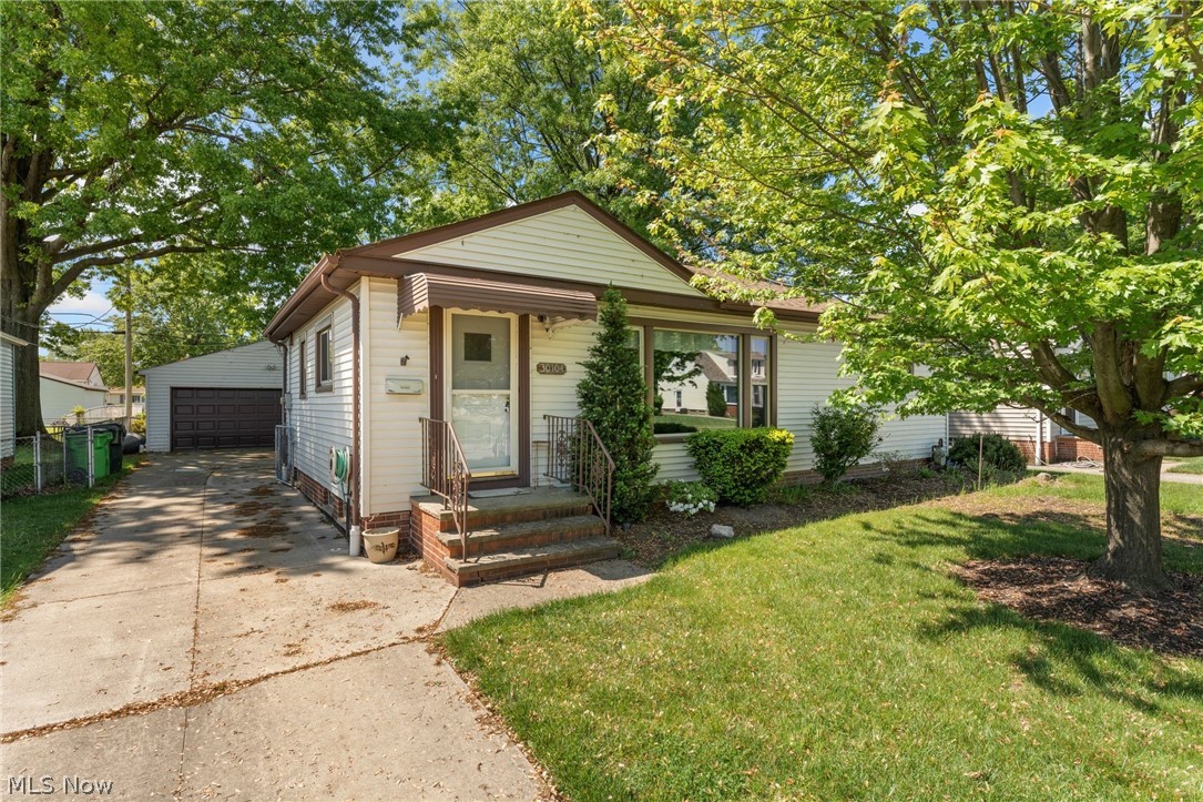 Welcome to this Ranch style home located in a quiet neighborhood in Willowick. Take a look inside and be greeted by the open carpeted living room with a large picture window and neutral colored walls. The living room flows directly into a formal dining area with LVP floors. The kitchen has white appliances and wood cabinetry that provides ample amounts of storage. Each bedroom has a sizable layout and large closets. The shared full bathroom has a single sink vanity and walk-in shower. Downstairs is the finished basement and laundry room that has a utility sink, toilet, and a walk-in shower. Outside the paved driveway leads to the detached 2+ car garage and grassy fully fenced backyard.