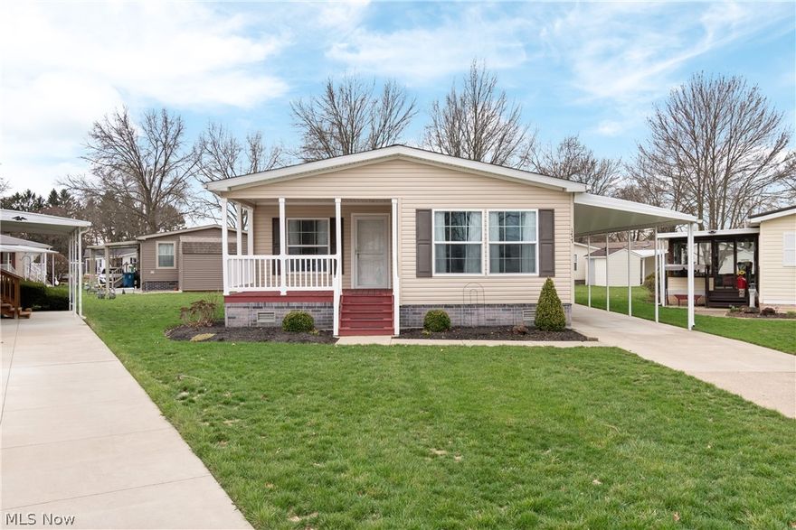 Built in 2017, this beautifully maintained home offers easy, comfortable living in a welcoming 55+ community. A charming front porch sets the tone, providing the perfect spot to relax and unwind. Inside, the open floor plan connects the great room, kitchen, and dining area—ideal for entertaining or everyday living. The kitchen features a convenient breakfast bar for quick meals or morning coffee. The spacious primary suite includes a private full bath and a walk-in closet. With drywall throughout, a brand-new roof and hot water tank in 2025, a storage shed, and a two-car carport, this home combines comfort, style, and convenience.
Utilities monthly budgets:  Columbia Gas $90.00, First Energy $135.00, water/sewer/trash are included in the lot rent fee.
