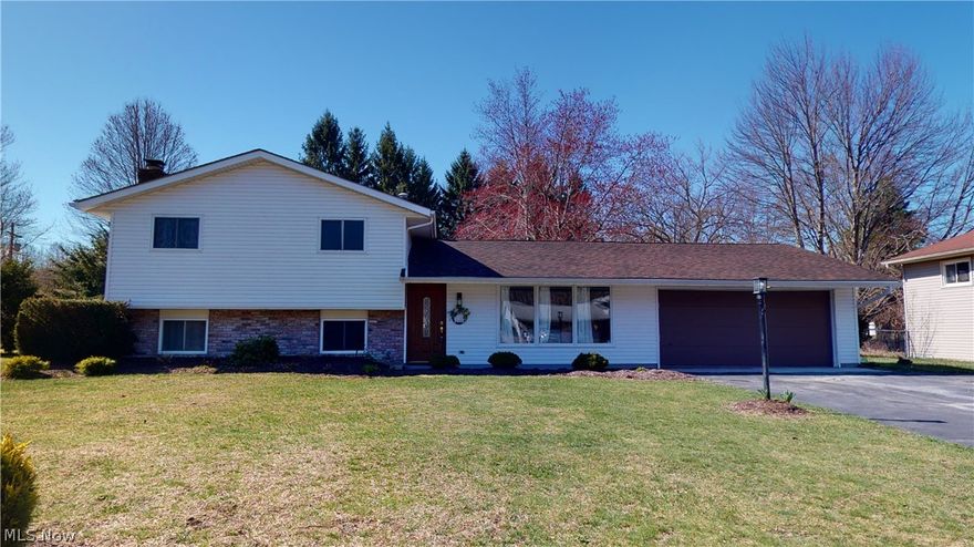 Welcome home to this remarkable split level. Completely remodeled over the last few years it is ready to move right in! From the manicured front yard to the large, private, tree lined backyard with patio and storage shed and everything in between, you'll love this home. You enter into a spacious living room, it is an open floor plan to kitchen and dining. The kitchen boasts double pantries, farm sink, Stainless appliances and lots of counter and cabinet space. The lower level has been updated, full bath, cozy fireplace and bedroom or could be office or play room and large laundry area. Upstairs you will find three nice sized bedrooms all equipped with ceiling fans and spacious closets. Master has double closets. Upstairs bath is completely remodeled. The home has wonderful, natural light throughout. Last, but not least, is the extra deep garage and double wide driveway! You will love all the extra space the garage has to offer and all the parking! Yep it finally came on the market, you