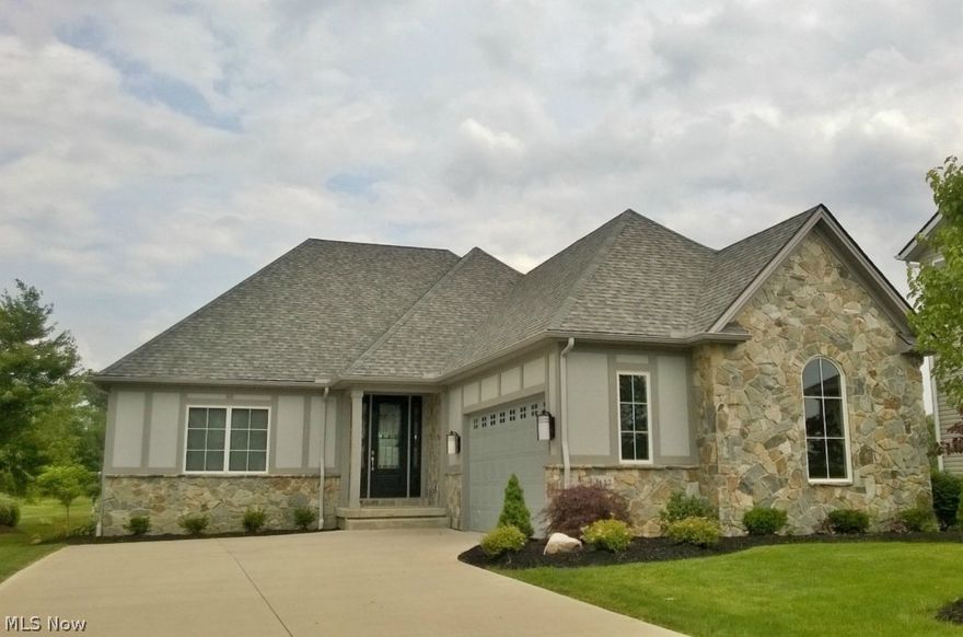 The Kensington by Buckingham homes features a Ranch plan with open kitchen, dining room, and great room with vaulted ceiling, rear deck and great golf course views.