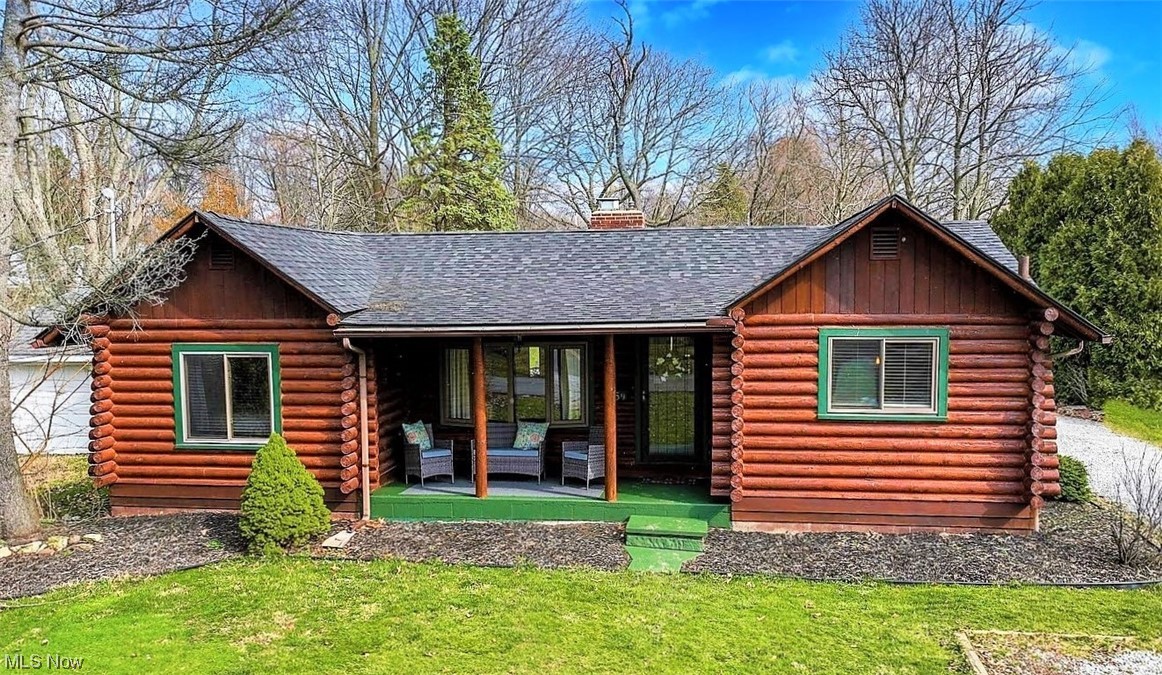*WOW ~ One Of A Kind Log Cabin RANCH In Stow Features 1,700 Sq. Ft Including 3 Bedrooms, 2 FULL Bathrooms, FINISHED Basement + More! *2 Car Garage On .35 Acres *Enjoy Relaxing On Dual Front & Back Covered Porch's!! *Dine & Entertain On A 500 Sq. Ft Brick Patio ~ So Peaceful *Updates Include: NEW ROOF W/Dimensional Shingles 2021, Garage Door, Dishwasher, Complete 1st Floor Bathroom REMODEL + Professionally Maintained Home Exterior Staining/Sealing *Step In To A Cozy Living Rm W/DRAMATIC 12' VAULTED BEAMED Ceiling, Fan & Beautiful - Floor To Ceiling STONE FIREPLACE! Bay Window & Door To The Back Patio *Gleaming Pine Logs And Knotty Pine Ceiling Throughout! *The Kitchen Showcases Slate Flooring, White Cabinetry, Fully Applianced W/Stainless Steel Gas Stove, Dishwasher AND Refrigerator, 4 Track Lighting + Rustic Black Accent Over Sink Pendant Lighting And Upgraded Thick Blind Window Treatments *Three 1st Floor Bedrooms W/Carpet *Remodeled Bathroom W/LUXURY Plank Floor, Gray Modern Vanity,