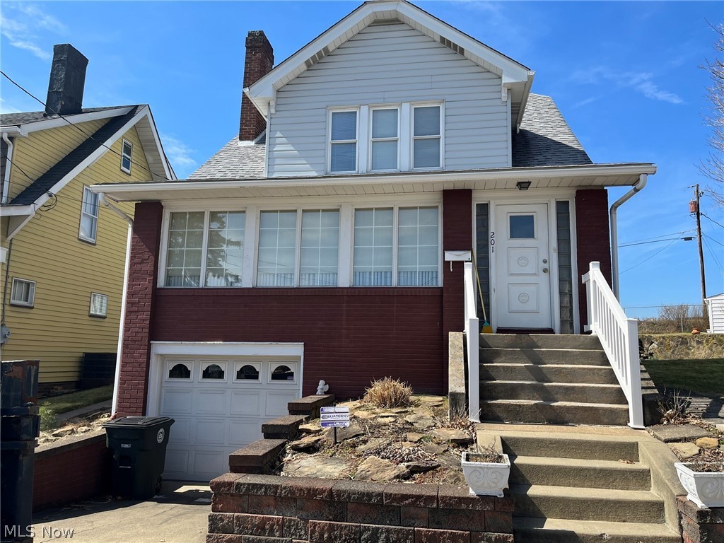 Don't miss the opportunity to view this beautiful home with old style charm. The kitchen is bright with character that shines through the imported glass from floor to ceiling. The large living room & formal dining room have tons of natural light. The large living space has custom built-ins which add to this home's charm along with large walk-in closets in each of the 3 bedrooms & a cedar closet for extra storage. This home also has a large flat back yard with a beautiful rock wall & steps to an upper level yard. It's easy to see the pride of ownership& craftmanship.