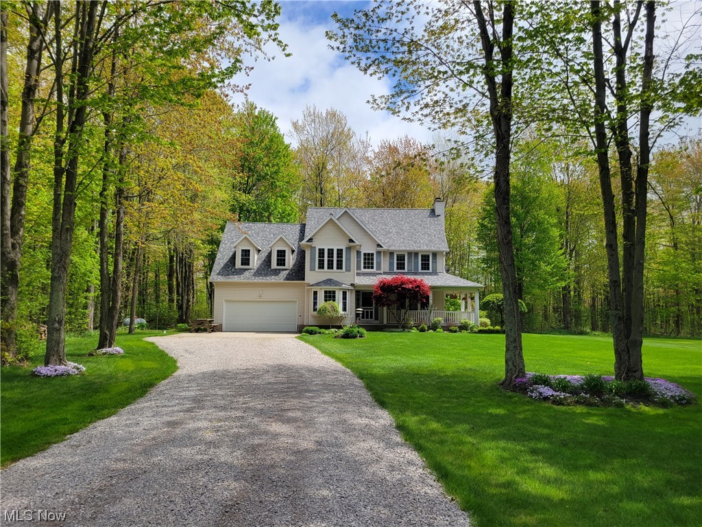 Escape the hustle and bustle of the city in this well-maintained colonial situated on just over 2 acres of partially wooded land in LeRoy Township. The original owner has occupied the home since building it in 1998. Inside you'll find 3 bedrooms and 2.5 baths, plus a finished bonus room on the second floor that can serve as a 4th bedroom, office, play room, or exercise space. Wood floors in the main hallway and eating area accent the wood trim and neutral colors throughout. Many improvements have been made in recent years, including the roof, windows, water treatment system, and heat pump/AC unit. Sit on the covered front porch and enjoy the landscaped yard which includes ornamental trees, flowering shrubs, and many perennial flowers. Several Metroparks, as well as I-90, are only minutes away while shopping and schools are less than 15 mins.