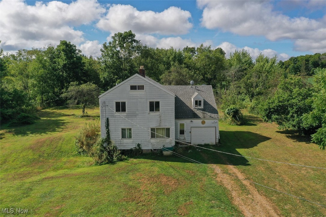 Estate Auction. 121+ Acres, 2 Hideaway Farmsteads Offered In 4 Parcels, Remodeled Bungalow Home & Large Pole Barn. Handyman Farmhouse with Rough Barn, Vacant Land Parcels, Marketable Timber. Osnaburg Twp., Osnaburg Local Schools. Live Auction with Online Bidding Available. All sells to settle the Donna Jean Middaugh Estate, Stark Co. probate #252544, on location. ONLINE BIDDING BEGINS TUESDAY, SEPTEMBER 16, 2025, at 12:30 PM, and AUCTION LIVE ON-SITE BIDDING WILL BEGIN FRIDAY, SEPTEMBER 19, 2025, at 12:30 PM. Longtime ownership, gently rolling land parcels with tillable acreage, a gas well, and all mineral rights owned by the estate are included. Marketable timber in back, ample frontage along Broadway Ave. Present crops reserved by the tenant farmer. Divided as follows: #1. Approx. 9.9 acres of vacant land with 317’ frontage, lies very nicely. #2. 2260 Broadway Ave. Approx. 45.1 acres hideaway farmstead. Handyman farmhouse built in 1837 with approx. 1,400 sq. ft. living area. 4 bedrooms and a full bath upstairs. Kitchen, dining & living rooms on main level with half bath. Walkout full basement. One-car attached garage. Hooked up to natural gas from the street. The old bank barn needs to be razed. Approx. 20 acres tillable, marketable timber in back (approx. 8 acres). Long private driveway! #3. Approx. 19.9 acres of vacant tillable land, with an existing gas well. Approx. 470’ frontage. Note: Parcels #1-#3 will be offered separately and together, selling whichever way brings the most. For Parcel #4 see MLS #5153257.