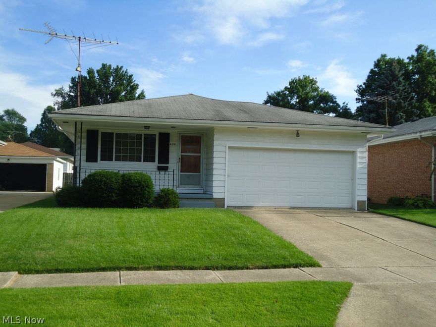 Easy living ranch in great location!  Newer carpet, windows and furnace (2015).  2 car attached garage.  Applianced kitchen with breakfast bar.  Large rec room.  Full bath in the basement.  Pretty wood flooring in the bedrooms.