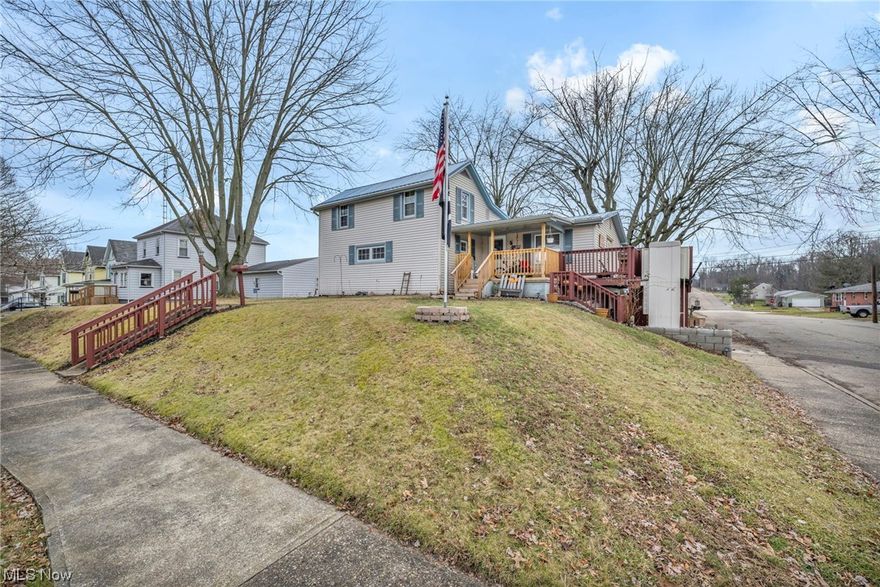 Come discover the perfect blend of space and comfort in this inviting 3 bedroom, 1.5 bath home in the quaint sought-after Village of Brewster in Fairless Local School District! Featuring 2 bedrooms on the main floor, and an additional bedroom plus a bonus room upstairs, this home offers versatility and functionality for your lifestyle needs. There are french doors in the spacious living room that lead out to a large balcony type deck for all your entertaining needs. There is a new metal roof ensuring durability and style. Accessibility is enhanced with a handicap elevator outside for convenience and also an updated full bath which features a handicap accessible shower. This home is situated on a nice corner lot and presents an ideal opportunity to enjoy the best of Brewster living! Set up your personal showing today! 24 hour notice is REQUIRED for all showings.