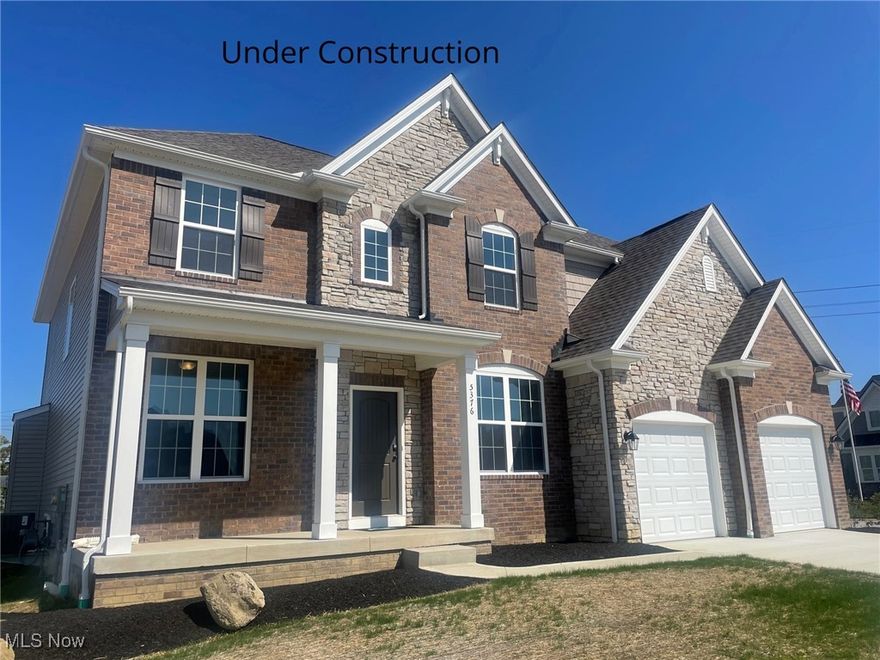 Location, location, location! The Buchanan floor plan by Drees Homes puts you right where you want to be.
Nestled in a prime spot within the highly acclaimed Hudson School District, this home is the perfect balance of
convenience, style, and comfort. Love the outdoors? Explore the winding trails of the Cuyahoga Valley National
Park just minutes away. Craving a night out? Gather friends at a local winery and then come home to your
stunning brick-and-stone retreat with a spacious three-car garage. Step inside and kick off your shoes in the
oversized mudroom—designed to keep everything neat and organized. The gourmet kitchen with walk-in
pantry is every chef's dream, opening seamlessly into the dining and two-story family room. After dinner, relax
under the stars on your large covered back porch or cozy up by the soaring fireplace. Work from home? The
private front office offers a quiet getaway. Looking for fun? Head down to the finished basement for movie night
or game day. When it's time to unwind, retreat to your luxurious primary suite featuring a spa-like oversized tile
shower. From everyday living to weekend entertaining, the Buchanan has something for everyone—and it’s
waiting for you. Home is under construction. Photos for illustration purposes.