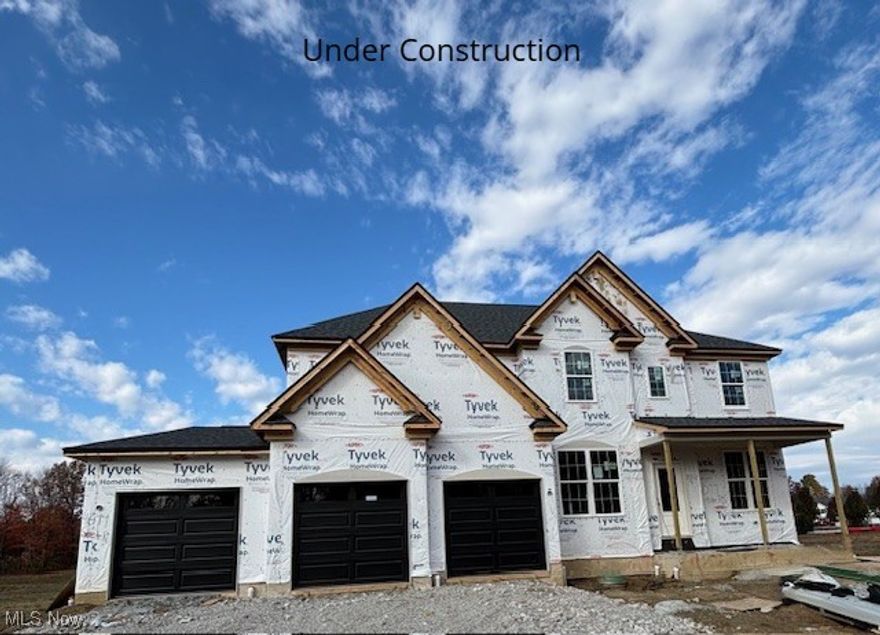 Location, location, location! The Buchanan floor plan by Drees Homes puts you right where you want to be.
Nestled in a prime spot within the highly acclaimed Hudson School District, this home is the perfect balance of
convenience, style, and comfort. Love the outdoors? Explore the winding trails of the Cuyahoga Valley National
Park just minutes away. Craving a night out? Gather friends at a local winery and then come home to your
stunning brick-and-stone retreat with a spacious three-car garage. Step inside and kick off your shoes in the
oversized mudroom—designed to keep everything neat and organized. The gourmet kitchen with walk-in
pantry is every chef's dream, opening seamlessly into the dining and two-story family room. After dinner, relax
under the stars on your large covered back porch or cozy up by the soaring fireplace. Work from home? The
private front office offers a quiet getaway. Looking for fun? Head down to the finished basement for movie night
or game day. When it's time to unwind, retreat to your luxurious primary suite featuring a spa-like oversized tile
shower. From everyday living to weekend entertaining, the Buchanan has something for everyone—and it’s
waiting for you. Home is under construction. Photos for illustration purposes.