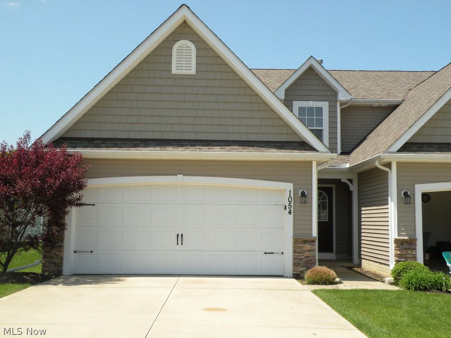 Completely renovated 3 bedrooms Lake Erie Shores Condo. Freshly painted! New Carpet. Open Floor plan. Living room with fire place. Dining room with walk out to back yard. Kitchen with breakfast bar. Dishwasher, gas stove. Utility closet. 1/2 bath. 2nd floor: 3 bedrooms with closets. 2 full baths. 2 car attached garage. Playground, pavilion and private beach access available with in development. Move in Ready!!!