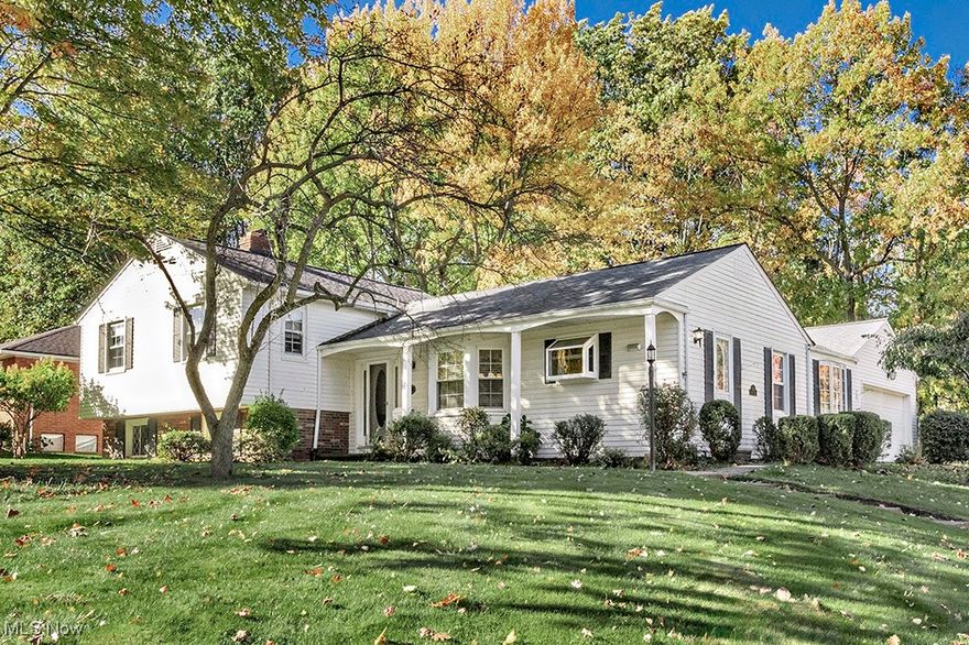 Welcome to a home that feels like a slice of the country nestled in the heart of beautiful suburbia. This inviting 2,300 sq. ft. split-level home offers plenty of space and comfort, situated on a corner lot in a quiet, established neighborhood.

The home features both a living room and a family room, as well as a dining room—so there is no shortage of areas to relax and entertain. Additionally, there is an enclosed porch and an enclosed sunroom with a wonderful skylight. This space has the potential to be used as an office, library, or playroom.

The bright and airy eat-in kitchen boasts a beautiful garden window that allows natural light to shine in. There are three spacious bedrooms that offer comfort and privacy. Crown molding is found throughout. Gorgeous natural hardwood spans most of the home, except for the lower level and bathrooms, which feature deluxe vinyl flooring.

For your DIY projects, don't miss the essential workbench to help you tackle tasks with ease.

In the family room, a newer gas fireplace with remote start adds both charm and efficiency. For added peace of mind, the home also includes a two-car attached garage with a newer hybrid polymer floor.

A spacious fenced-in yard is perfect for gardening, play, or entertaining. Close to schools, parks, and shopping, this home offers added convenience.

This home exudes warmth and character.
Don’t miss the opportunity to make this well-loved property your own.