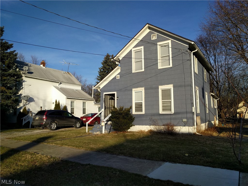 Spacious home near University of Akron and hospitals. Kitchen has plenty of cabinet space with dinette and laundry just to the side. First floor bedroom and two roomy bedrooms upstairs. Also has a bonus room on second floor that could be used as a den or home office. Great opportunity for investors or first-time home buyers. Sold AS-IS, no repair or warranties.