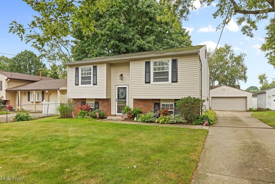 Completely updated 4 bedroom, 2 full bath home with easy maintenance landscaping. Enter into the foyer, continue upstairs to the open concept living room and dining area. Painted in neutral colors with NEW LVP flooring. The kitchen features oak cabinetry and ample storage with windows surrounding to let in the sunshine. With 2 bedrooms nice sized bedrooms upstairs and a full bath with a tranquil feeling to take a relaxing bubble bath in. In the lower level is a family/recreation room. Offering 2 more nice sized bedrooms a full bath with walk in shower. A laundry area with walkout to the backyard. A 2 car detached garage and half fenced in yard. Nothing to do but move in and call it home. Call today to schedule your personal tour.