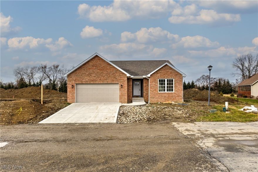 Awesome brick and vinyl 2-bedroom ranch villa! Extra large great room with skylights, vaulted ceiling and gas fireplace. The beautiful white eat-in kitchen is bright and spacious with a large breakfast bar, an abundance of cabinet space and adjacent first floor laundry room with built-in cabinets. The large master bedroom boasts a walk-in closet plus an additional large closet. The master bathroom has a unique corner sink cabinet with loads of cabinet space and beautiful tile shower. The second bedroom and full family bath complete the first floor. Enjoy entertaining outdoors on the 13x12 covered deck just off the kitchen with recessed lighting that leads to a 12x12 cement patio overlooking a private lot. The possibilities are endless in the 12-course unfinished basement that is plumbed for an additional bath. Make it yours! The 2-car garage includes hot and cold water, drain and openers. Private, free standing condo living in a convenient location!