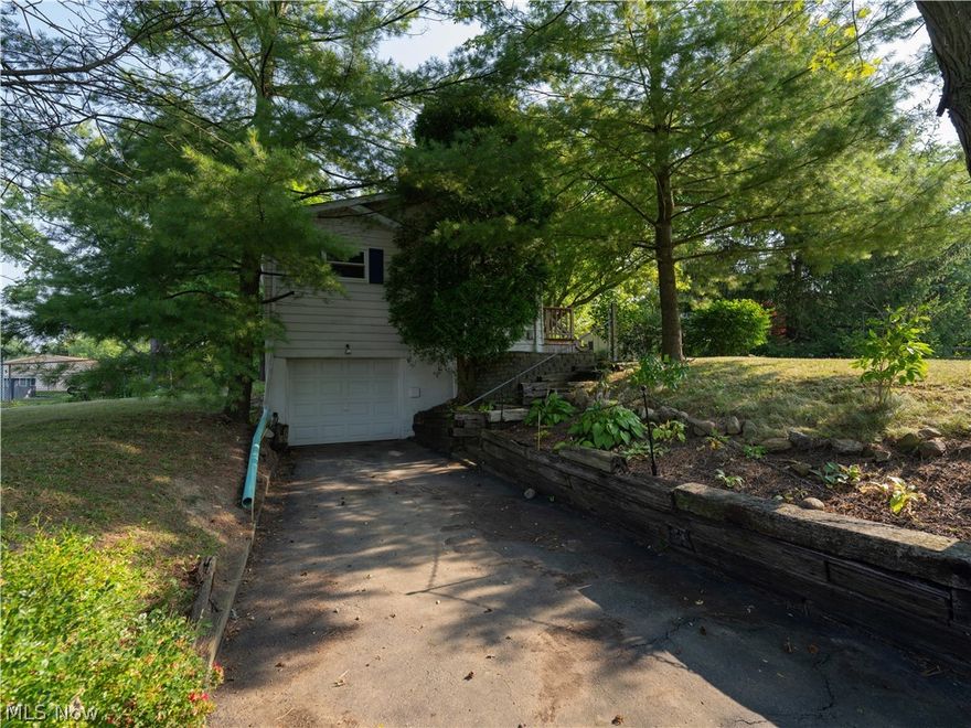 Fantastic opportunity to own your own home in Streetsboro! This 3 bedroom, one bath ranch home is waiting for the new owner to make the final finishing touches to make this home their own. Centrally located in the heart of Streetsboro is this cozy ranch with full basement, one car attached garage on a large .63 acre lot with a fenced backyard! Some updates include: New oil tank (2024), Walk in shower (2023), New vanity in bathroom (2022), New front porch (2022), New windows upstairs (2017) and asphalt driveway (2019). Call your favorite realtor to schedule your private showing!