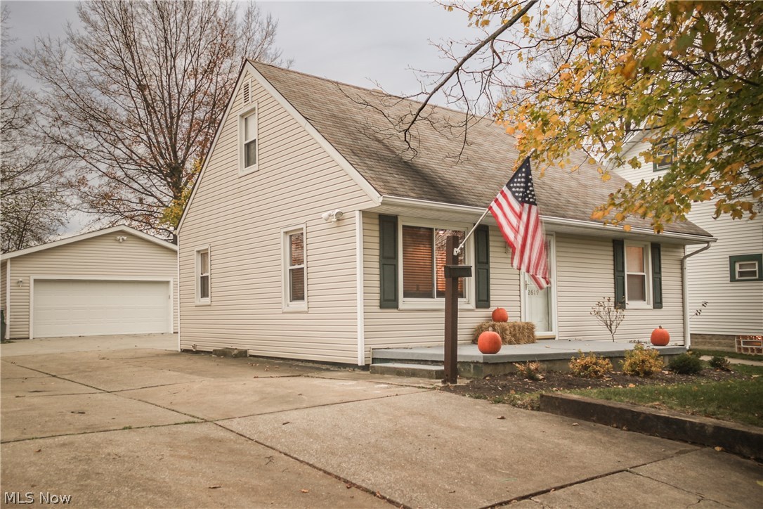 This 3 bedroom 1 full bath home is Move-In Ready and has a 2 car garage! There are many updates; 2009- New siding, windows (whole house), sliding back door, storm door, front door, security lights, water heater, electric box, and concrete patio/driveway. 2012 - New Central air. 2015 - Chimney retucked, retaining wall along the driveway and sidewalk. The kitchen cabinets were replaced with beautiful custom maple cabinets. Stainless steel appliances and fixtures were added. Flooring and countertops were replaced and lighting added. The bathroom was totally redone with a newer shower, flooring, vanity, and lighting. The garage is huge! It's a 24x24 with a concrete pad, 220 electric, outlets throughout, and an insulated garage door with opener! The landscaping updated in 2014 too. This home has so much to offer. You must come and see it for yourself!