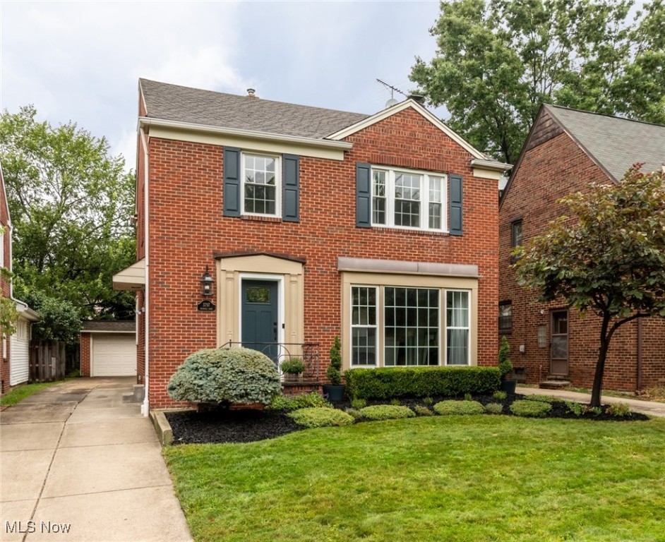 Your search for the perfect home is over! Welcome to this fully renovated all-brick Colonial on a prime University Heights street. From the curb, this home makes a statement with refreshed landscaping, exterior lighting, updated shutters, and a newer front door. Step inside to a spacious combination Living and Dining room, highlighted by a full-wall front window, newer Luxury Vinyl Tile floors, custom tile work on the gas fireplace, and newer chandelier in Dining area. The Chef’s Kitchen, newly remodeled, features Whirlpool Stainless Steel appliances, Quartz countertops, hand tiled backsplash, custom cabinetry and island with breakfast bar and custom wine rack. A cozy Den with electric fireplace provides the perfect retreat, while a stylishly updated Powder Room adds convenience. Upstairs, find three freshly painted bedrooms with Bamboo flooring and solid wood doors. The Primary Suite boasts a tray ceiling and ceiling fan, with a beautifully renovated Full Bath offering both tub and walk-in shower. Don’t miss the charming rooftop garden off the second bedroom—an ideal spot to unwind. The Lower Level impresses with a Manhattan-inspired Additional Living Suite: new LVT floors and drywall (2024), bedroom with egress window, and a luxe Spa Bath with glass shower, modern vanity, and all-new plumbing (2024). Additional storage and laundry complete the basement. This home has been meticulously cared for—no detail overlooked, every upgrade thoughtfully designed. Move right in and enjoy!
